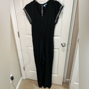 Black crinkle rayon light weight jumpsuit with black and white trim by Cece M